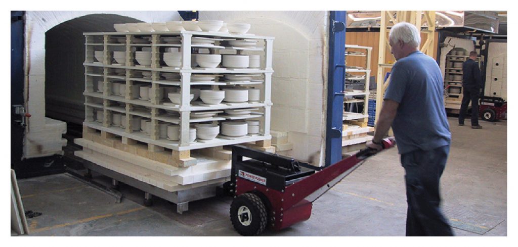 Power Pusher moving kiln trolley in and out of autoclave